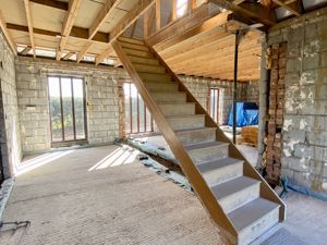 Stairs to first floor- click for photo gallery
